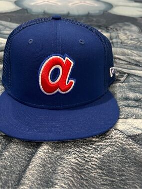 New Era Blue Trucker Hat with Red 'a' Patch